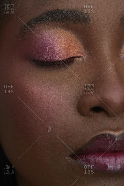 Portrait of African woman- closed eye- close-up- made up