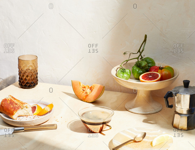 Breakfast table with fresh fruit and bread serve with coffee