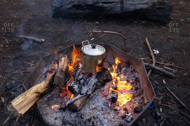 Tea Kettle on Open Fire. Tea in the Camping Stock Image - Image of