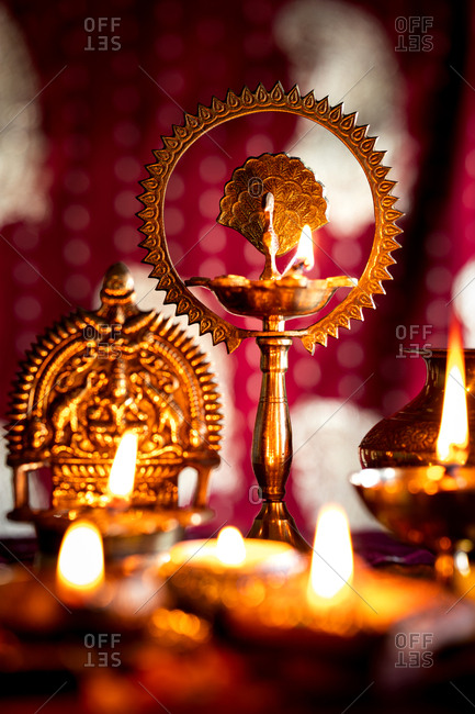 Close-up of candles lit for Diwali, the festival of light