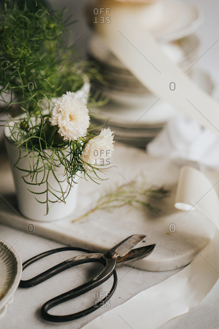 White flowers with vintage sissors  and ribbon