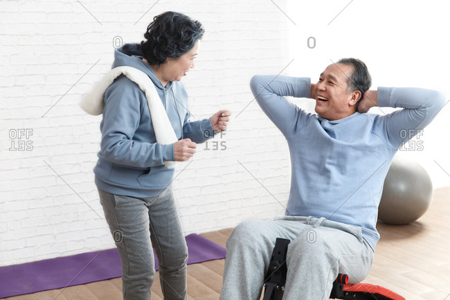 Elderly couple fitness movement - Offset
