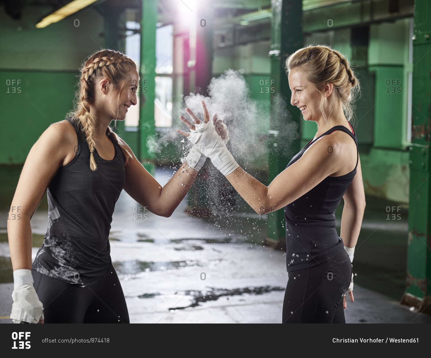 Two female martial arts shaking hands after training