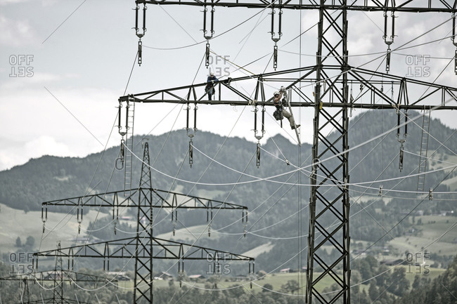 Installer during installation of high-voltage power line