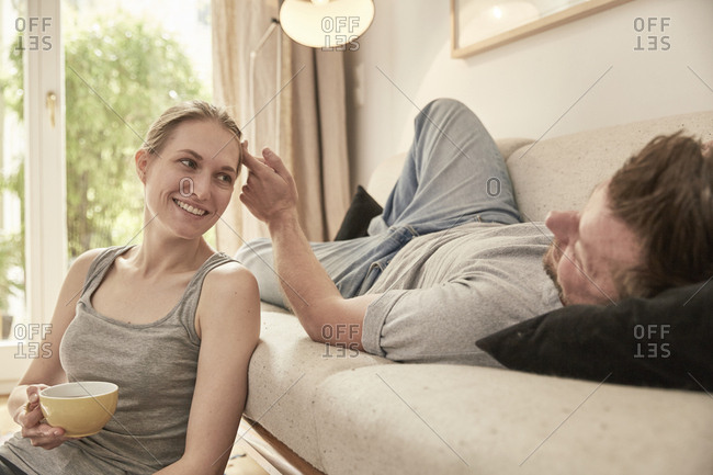 Relaxed couple in living room