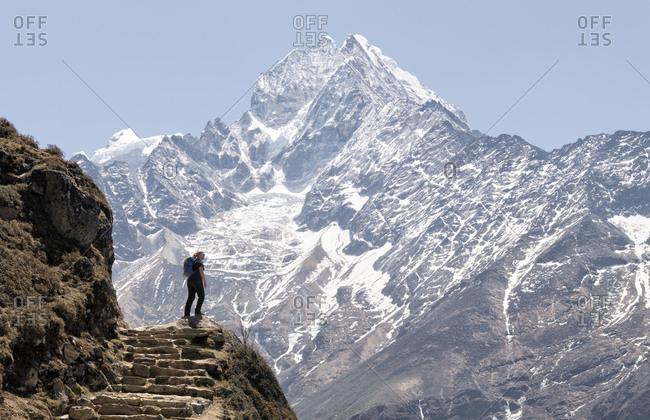 Woman in front of Thamersku mountain- Himalayas- Solo Khumbu- Nepal