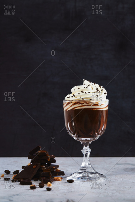 Delicious chocolate pudding with whipped cream and sprinkles