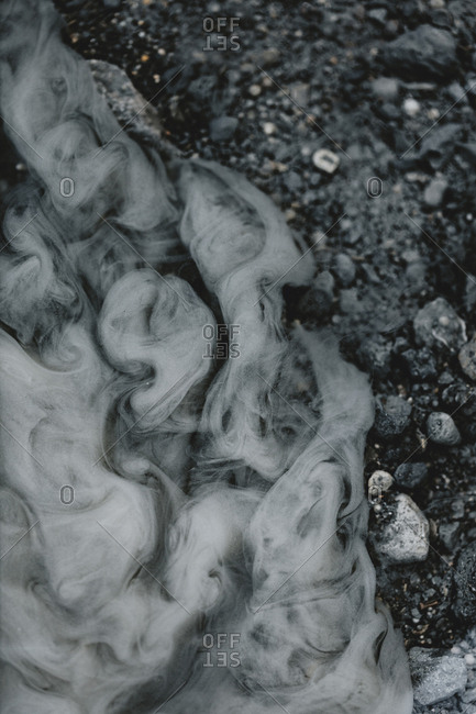 Abstract textures with sand and water from a tiny river