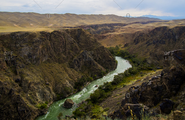 Scenic view of river in valley