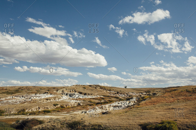 Scenic view of landscape against cloudy sky