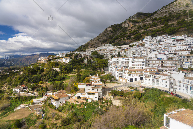 View of the village of Mijas in winter  with houses on a hill