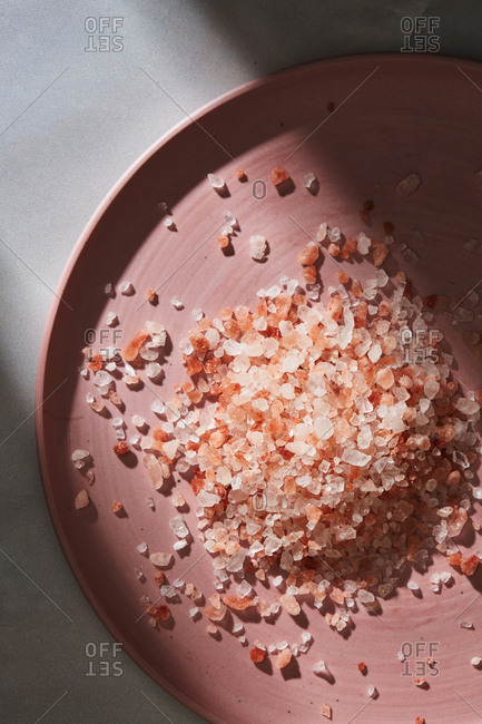 Himalayan salt on a pink plate