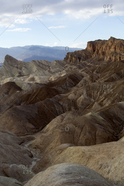 Layered and textured rocky landscape, Zabriskie Point, Death Valley.