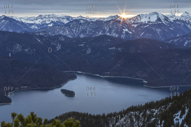Germany, bavaria, bavarian alps, walchensee, view of the herzogstand on the walchensee at sunrise