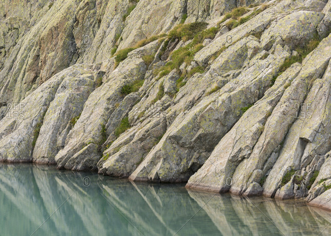 Granite on the shore of lac blanc, haute-savoie, france