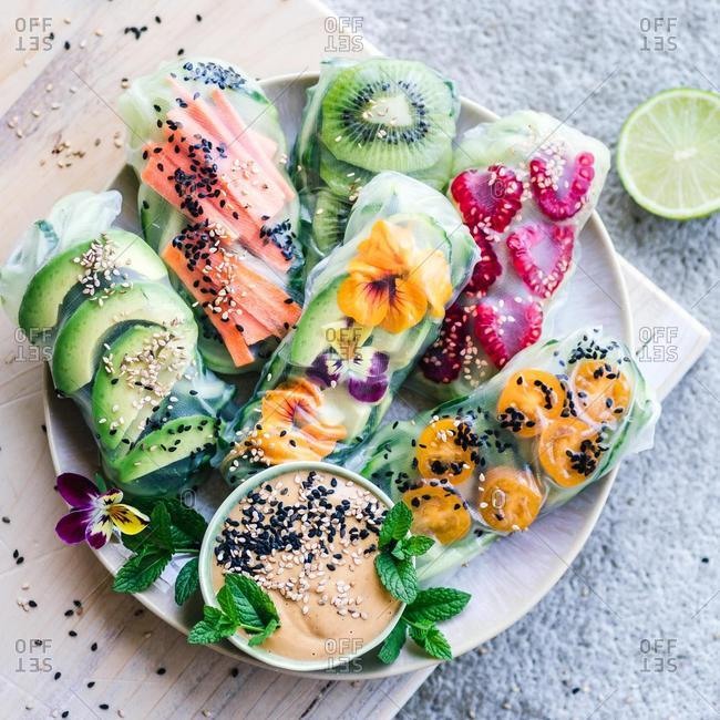 Fruit and vegetable spring rolls with peanut butter dip