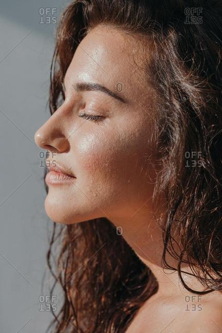 Portrait of a beautiful woman with her eyes closed