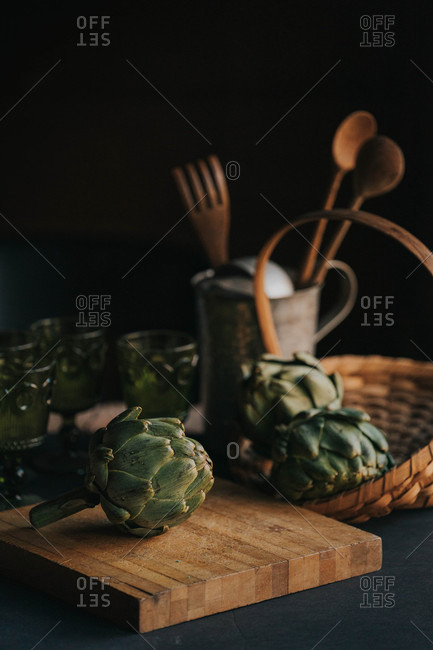 Artichoke on a wooden cutting board