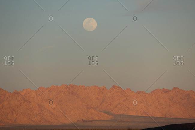 scenic view of mountain against sky during sunset