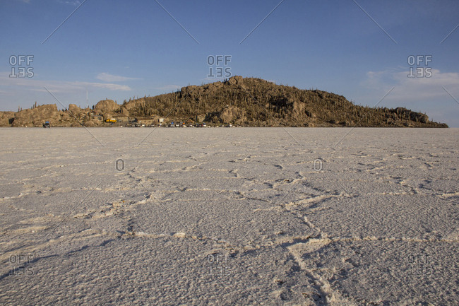 Scenic view of Salar de Uyuni against mountains and sky