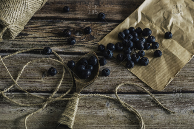 Tasty bilberry on wooden surface