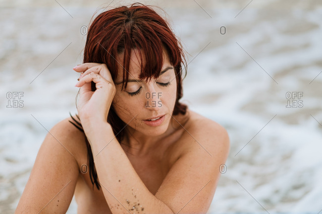 Naked Female Adjusts Hairstyle, Rear View Stock Image - Image of