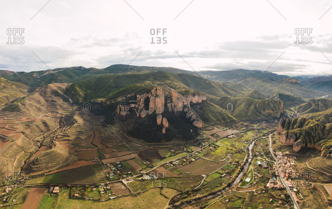 Aerial view of mountain chain and village landscape in Islallana, La Rioja, Spain