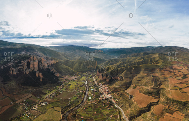 Aerial view of mountain chain and village landscape in Islallana, La Rioja, Spain