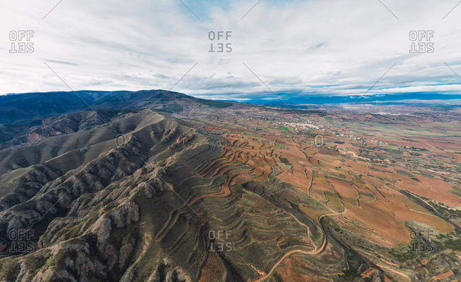 Aerial view of mountain chain and village landscape in Islallana, La Rioja, Spain