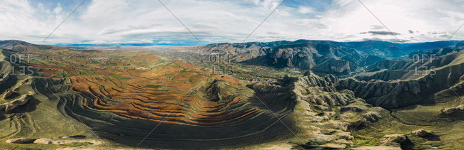 Aerial panoramic 180� view of mountain chain and village landscape in Islallana, La Rioja, Spain