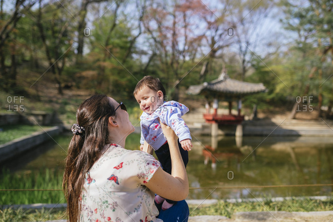 Mother and baby girl visiting the Secret Garden of Changdeokgung Palace- Seoul- South Korea
