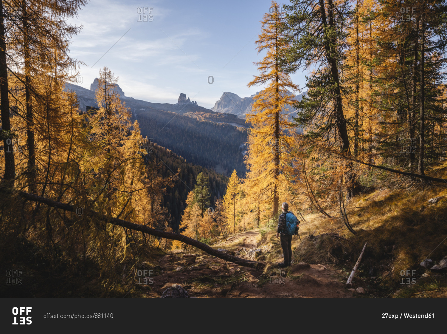 Hiker enjoying Dolomites in autumn- Veneto- Italy