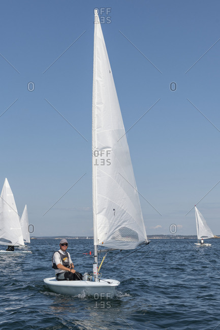 Man sailing boat on sea