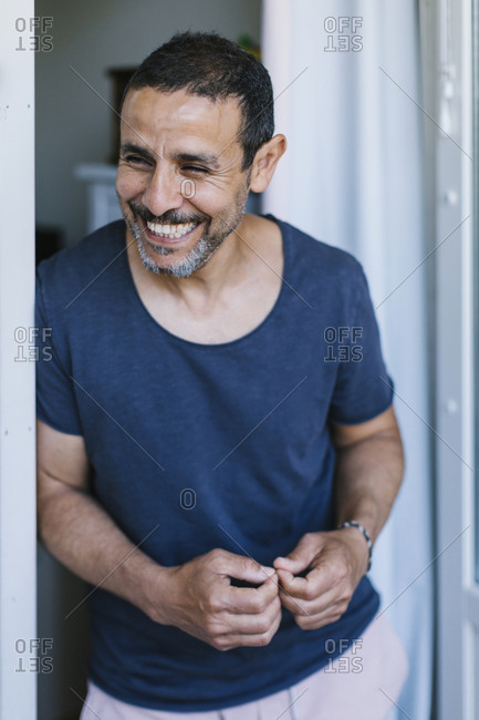 Smiling man looking away