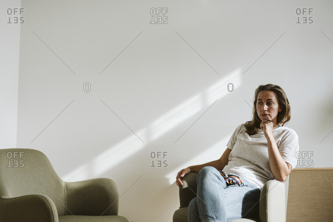 Thoughtful woman looking away