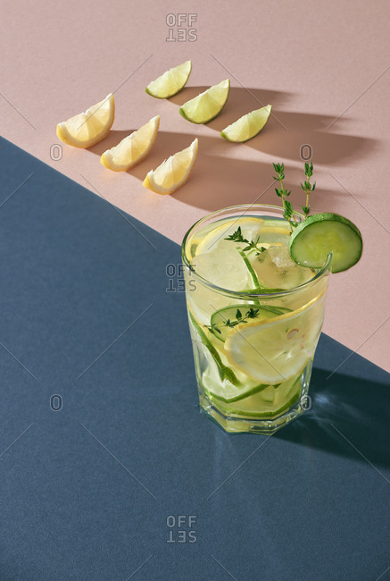 Health care, fitness, healthy nutrition diet concept. Fresh cool lemon cucumber mint infused water
