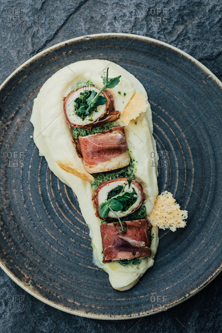 Pork rolls on mashed potatoes