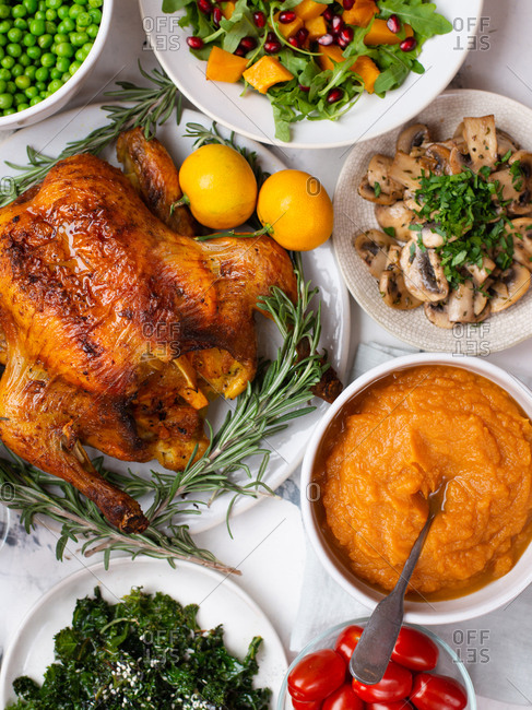 Thanksgiving dinner with roasted chicken and sides
