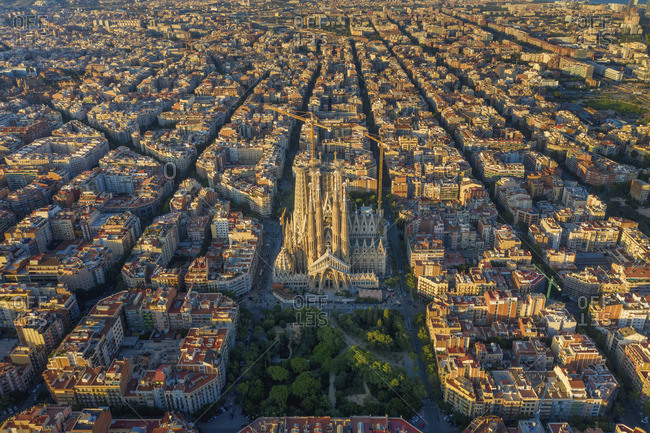 Spain - August 2, 2019: Spain, Catalunya, Barcelona, Aerial view of Eixample district and Sagrada Familia Cathedral