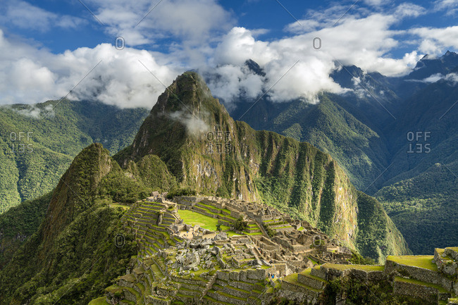 Historic ancient archeological Incan Machu Picchu on mountain in Andes, Cuzco Region, Peru