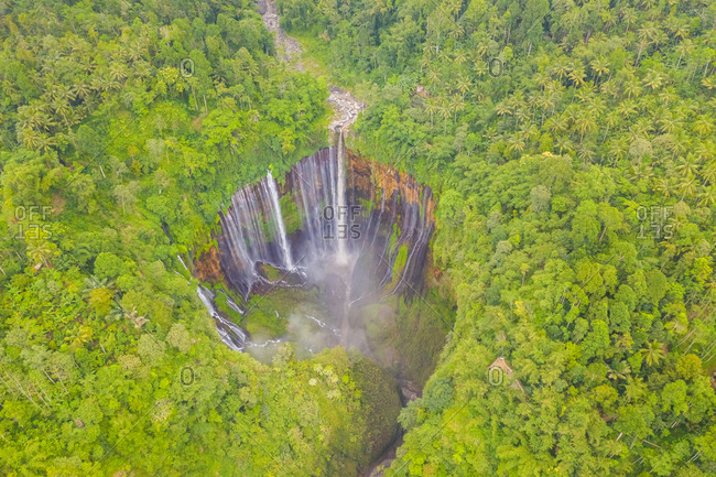 Aerial view of Tumpak Sewu Waterfall, Indonesia. stock photo - OFFSET