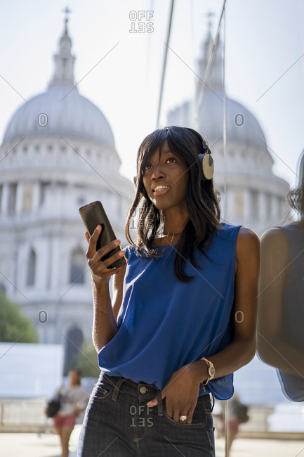 Female Afro-American listening to music in London- England- Great Britain