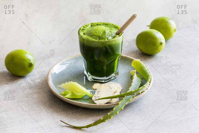 Freshly squeezed vegetable juice with aloe vera in a glass