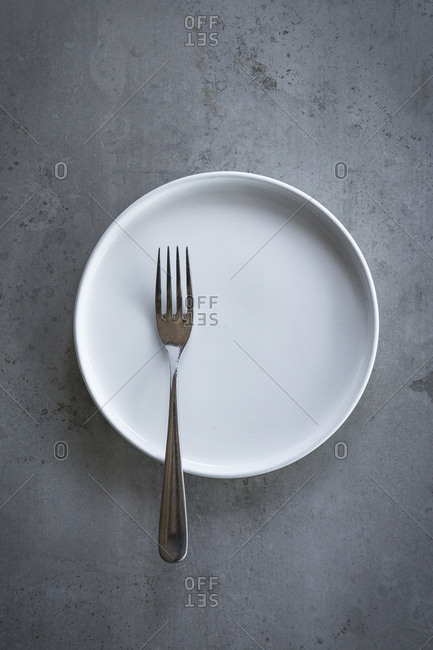 A fork on a white plate