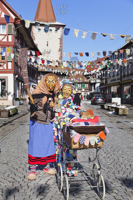 February 10, 2013: Witch and spattlehansel with buggy, 'schwabisch-alemannisch fastnacht' (carnival), gengenbacher, black forest, baden-wurttemberg, Germany