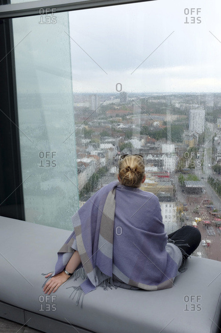 Woman, view over hamburg from the 'clouds' restaurant