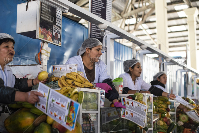 Cusco, Peru - April 4, 2019: Fruit vendors in San Pedro Market