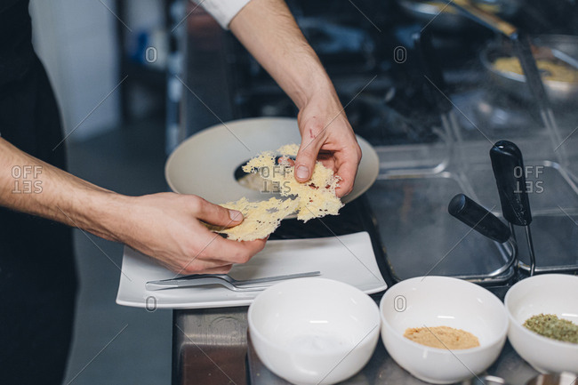 Chef preparing a dish in an Italian restaurant