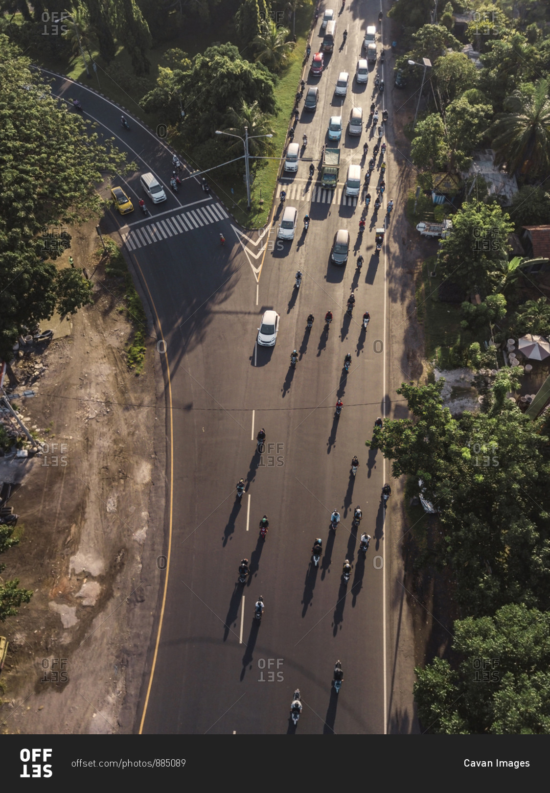 Aerial view of cars and motorbikes on the road