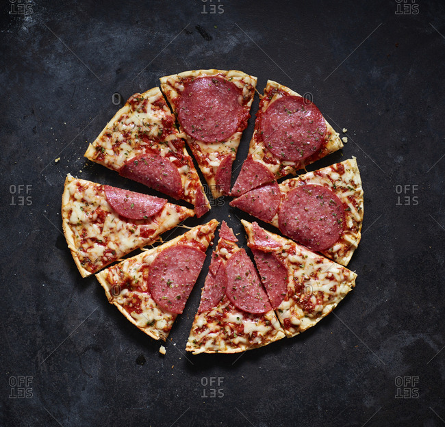 Slices of salami pizza